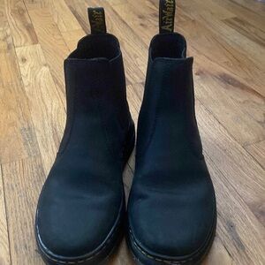 Women size 7 Dr. Martens 
Unisex as per take also fits Men 6